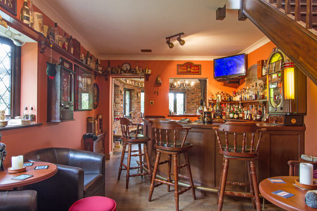 homeowner's private pub with jukebox